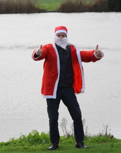 Santa Claus kayak challenge for Douglas Stafford team member - Douglas Stafford Mystery Shopping